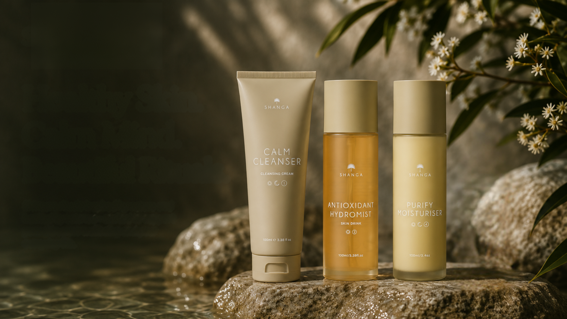 Three skincare products on a stone surface with a natural background